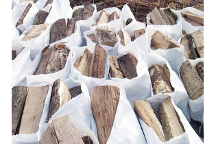 Дрова березовые колотые - в мешках по 0,01 куб.м.